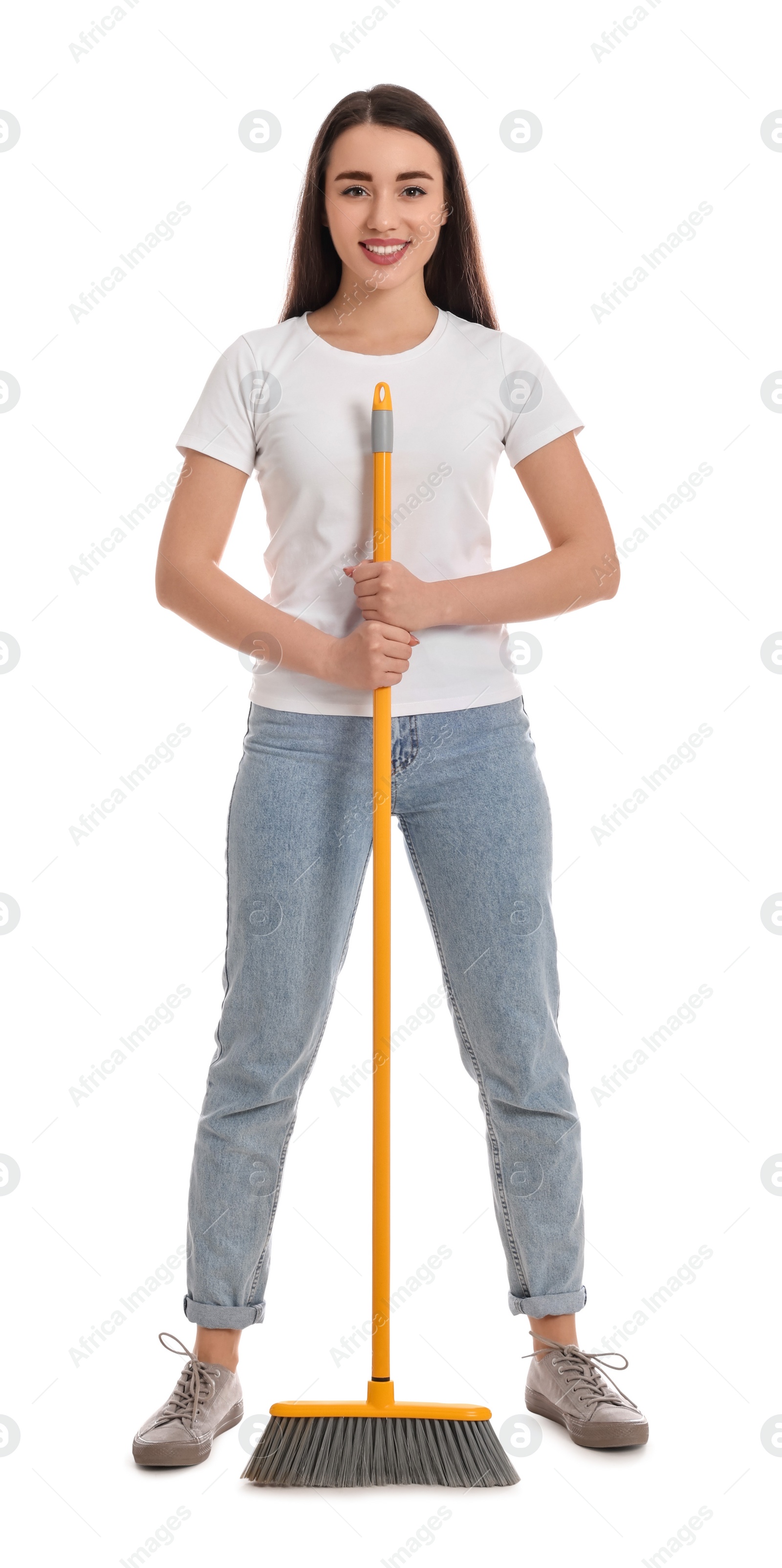 Photo of Beautiful young woman with broom on white background