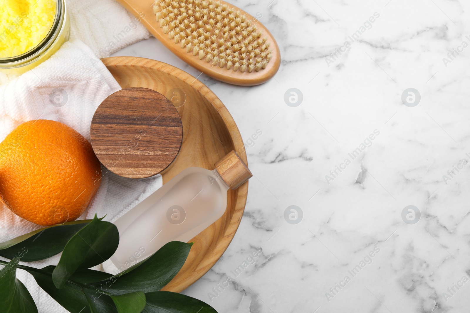 Photo of Flat lay composition with cosmetic products on white marble table, space for text. Anti cellulite treatment