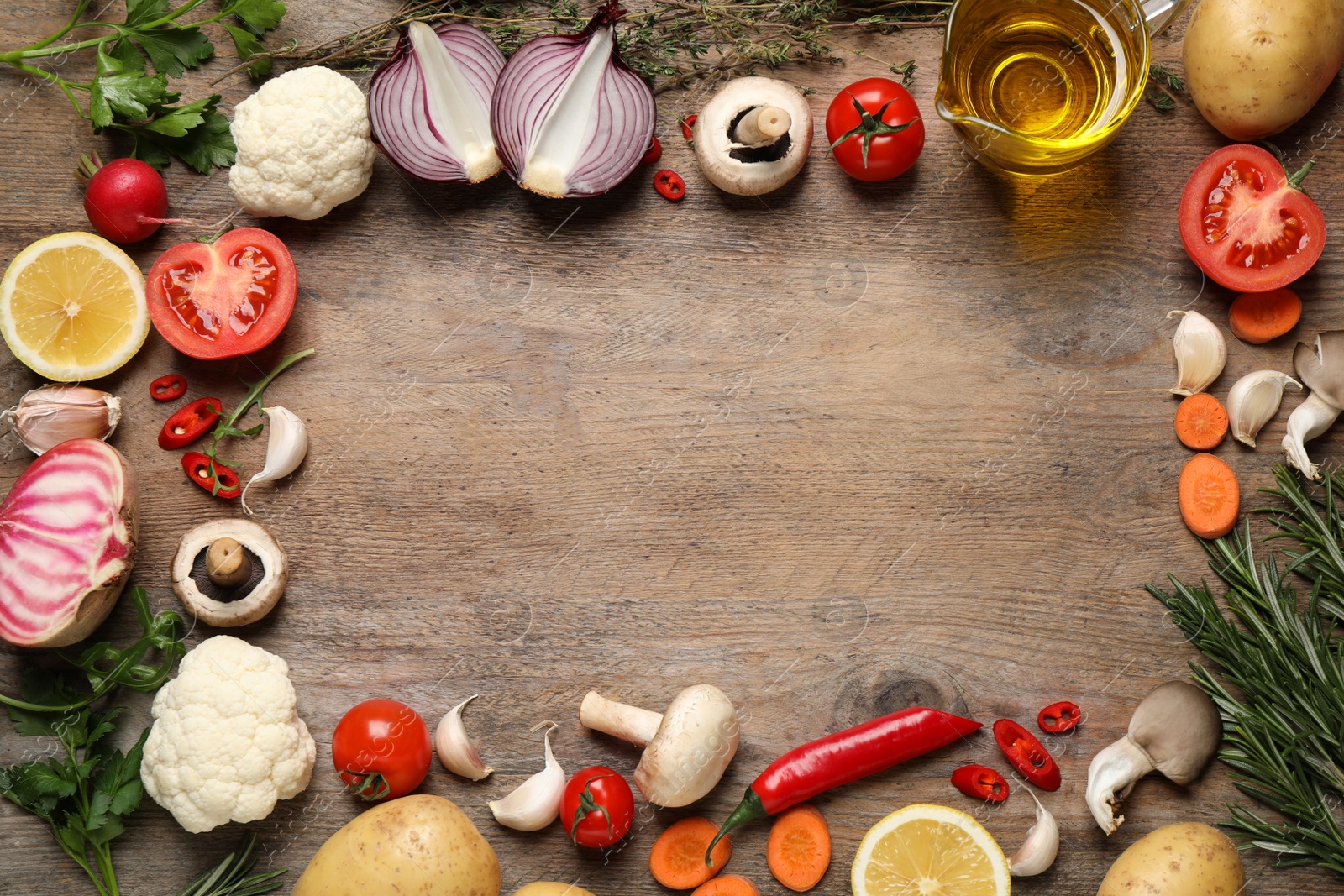 Photo of Flat lay composition with fresh products on wooden table, space for text. Healthy cooking