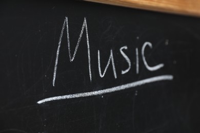 Photo of Word Music written with chalk on blackboard