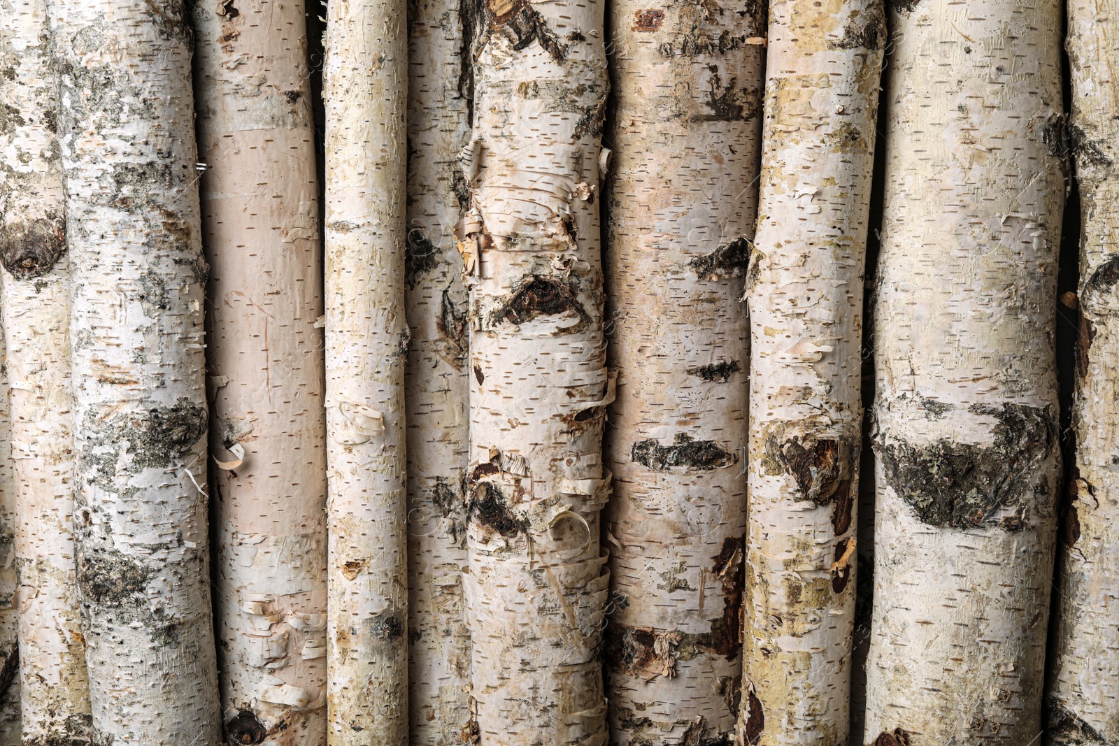 Photo of Cut firewood as background, closeup. Heating in winter