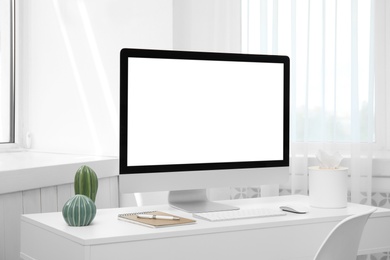 Photo of Comfortable workplace with modern computer on table