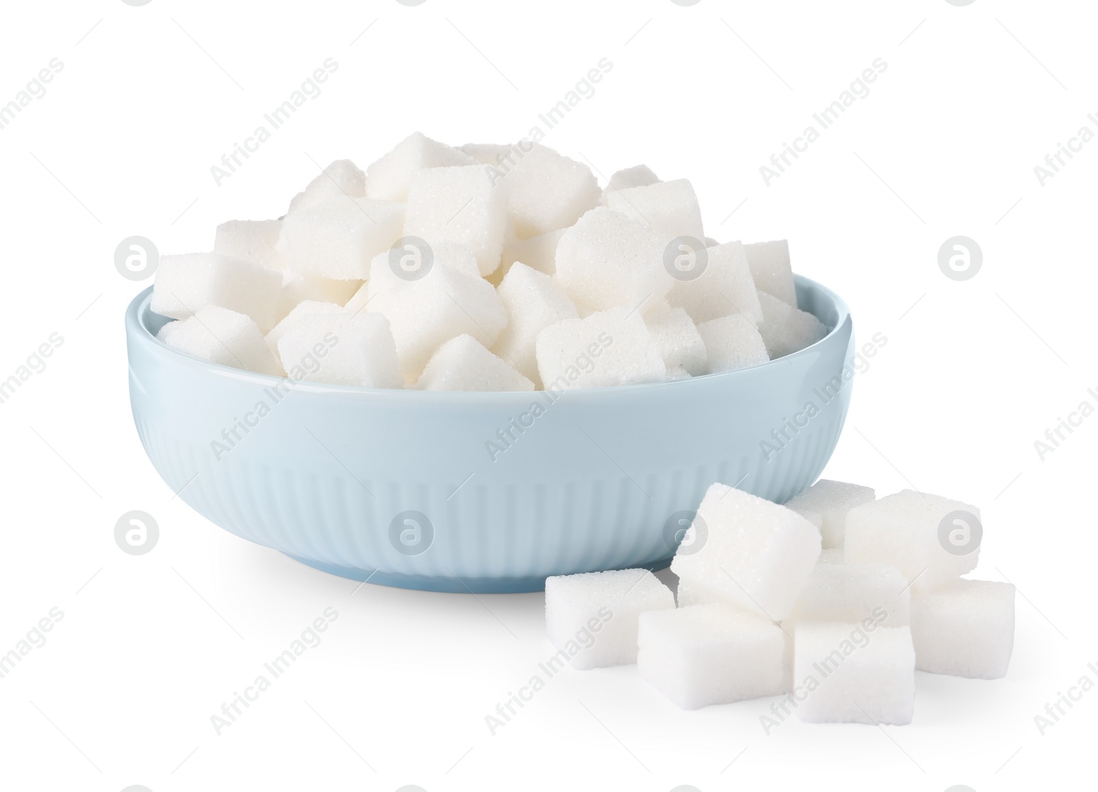 Photo of Bowl and refined sugar cubes on white background