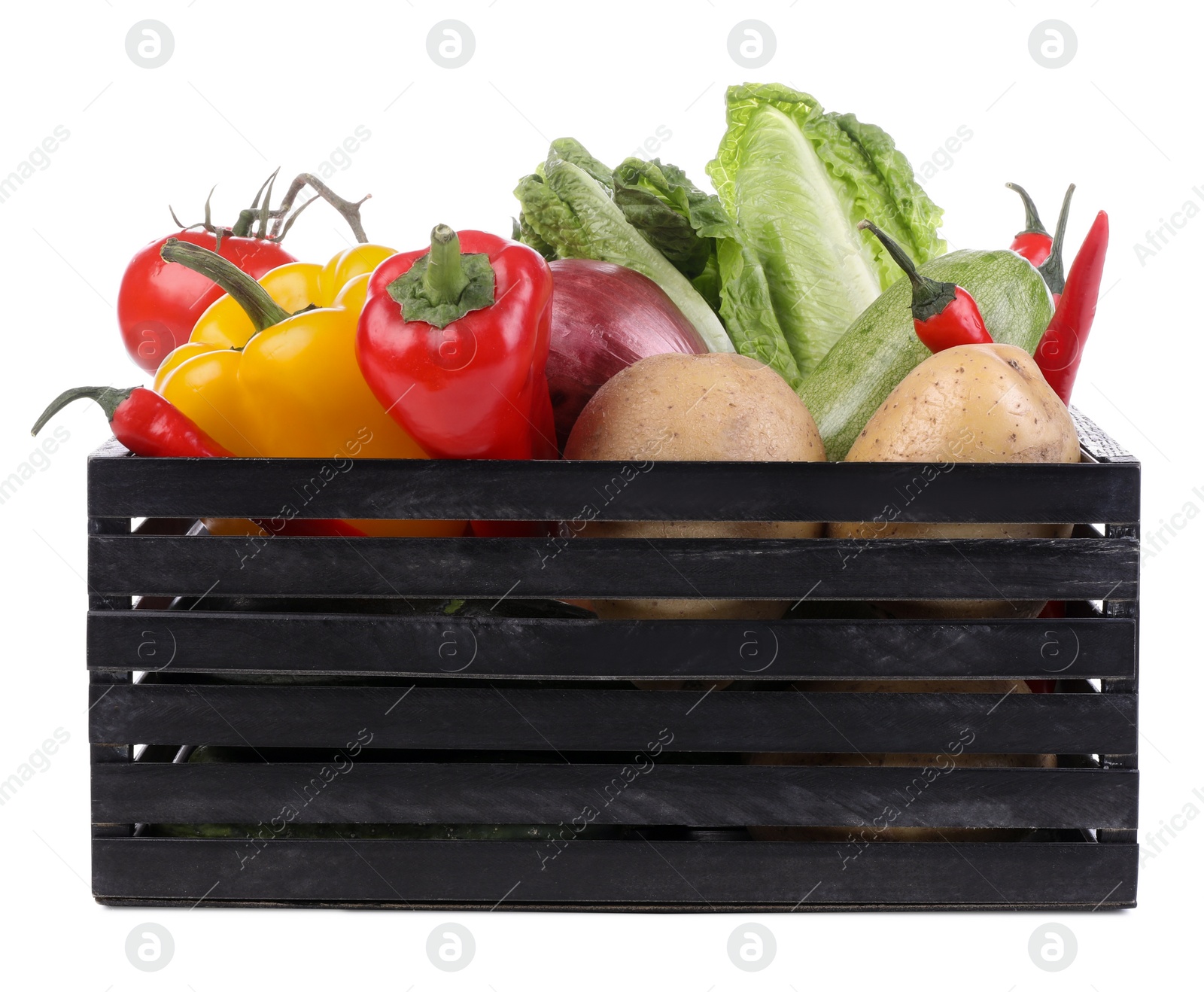 Photo of Crate with fresh ripe vegetables on white background