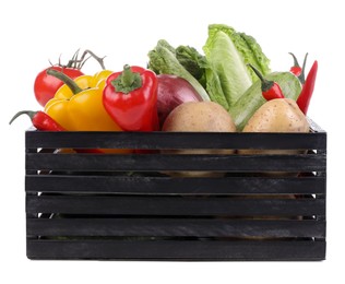 Crate with fresh ripe vegetables on white background