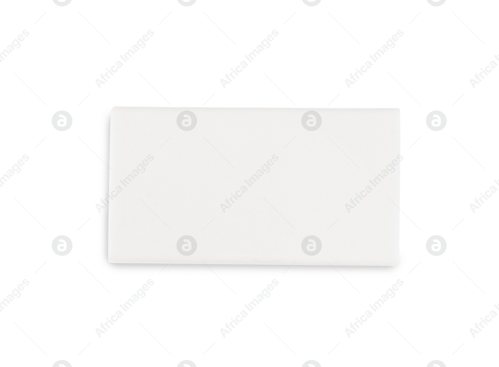 Photo of New eraser isolated on white, top view. School stationery