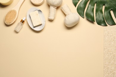 Bath accessories. Flat lay composition with personal care products on beige background, space for text