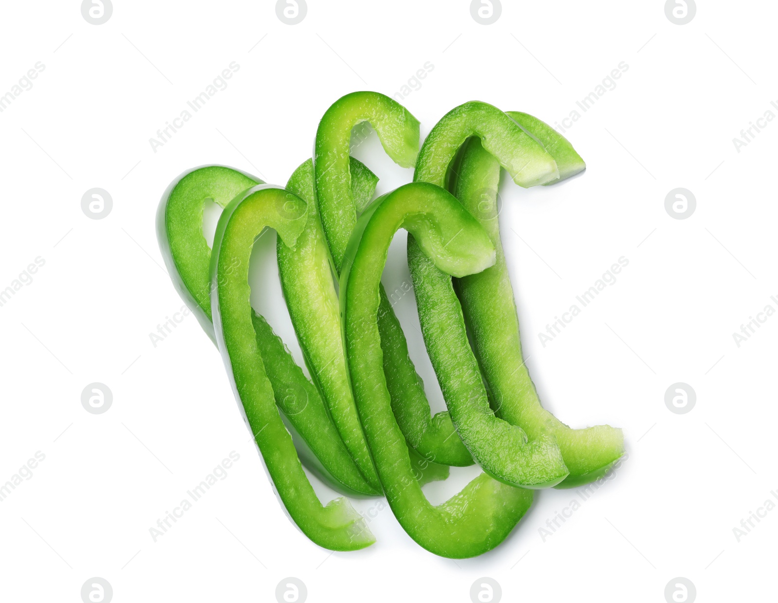 Photo of Pile of green bell pepper slices on white background, top view