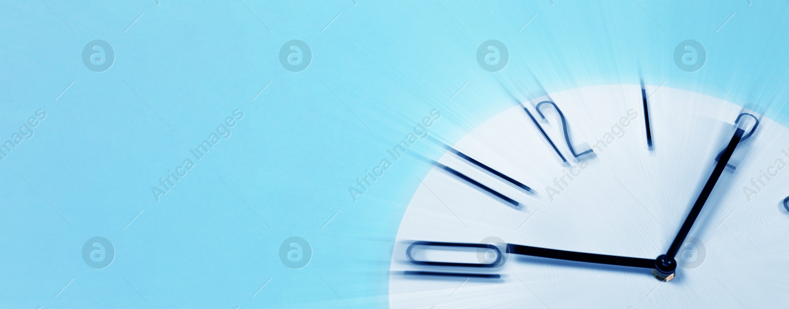 Image of Fleeting time concept. Clock on light blue background, motion effect. Banner design with space for text