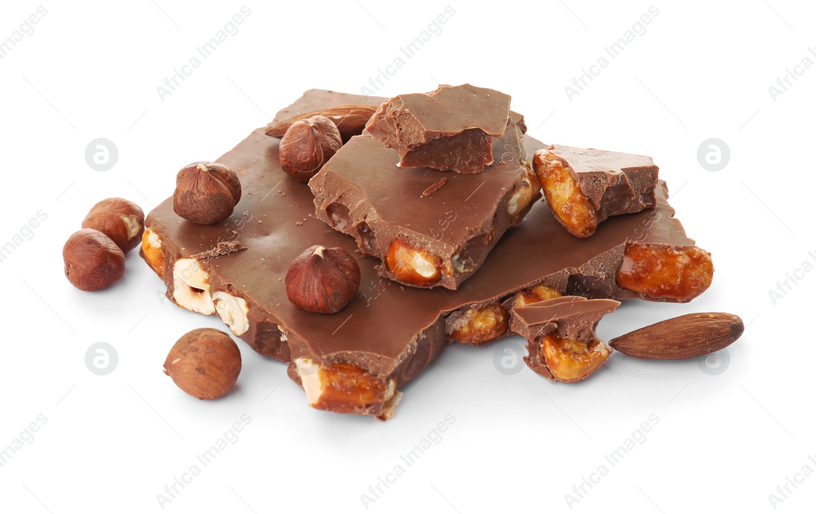 Photo of Delicious milk chocolate with nuts on white background