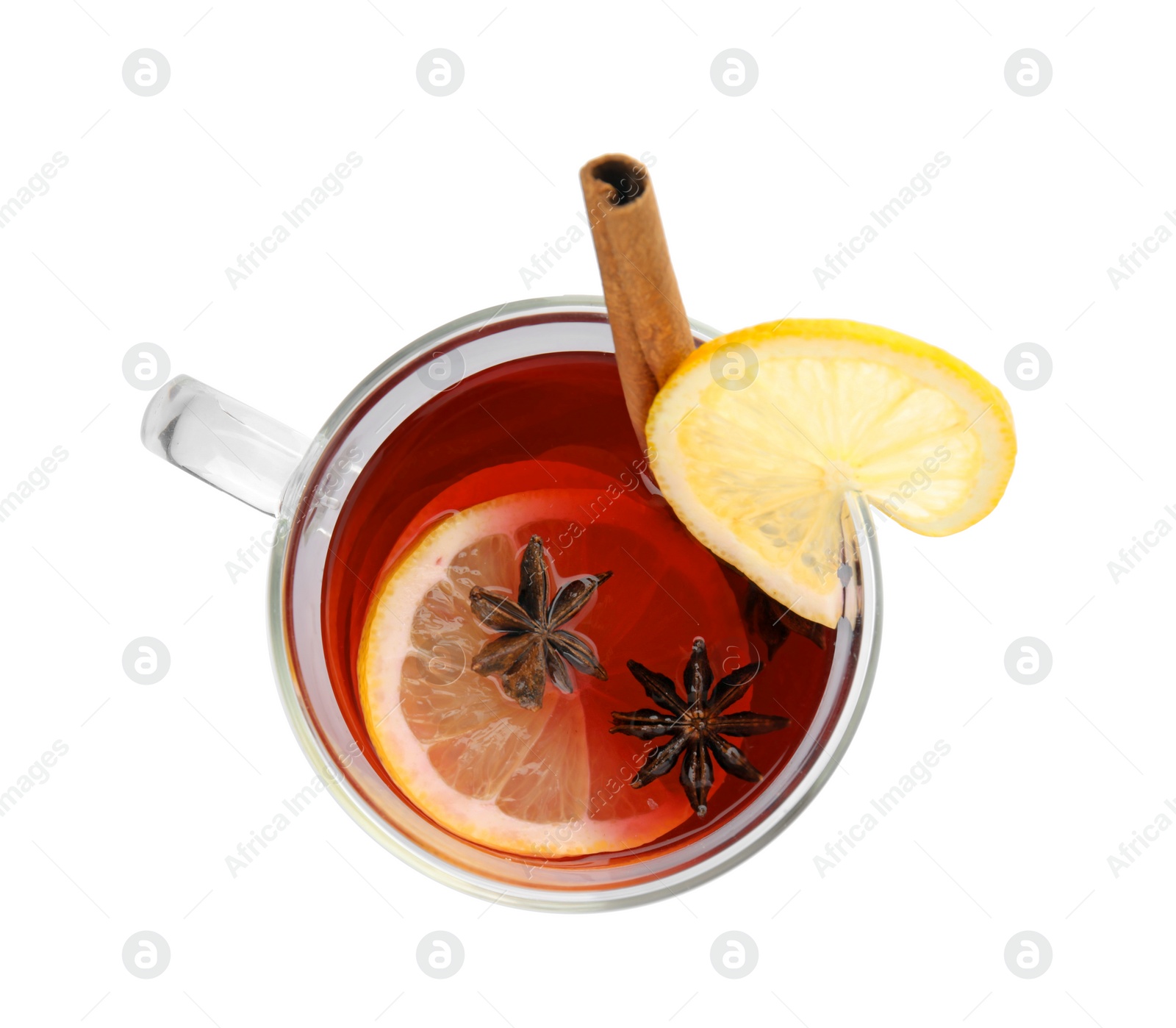 Photo of Glass cup of mulled wine with lemon isolated on white, top view