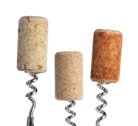 Image of Corkscrews with wine corks on white background