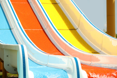 Photo of Water park with colorful slides. Summer vacation