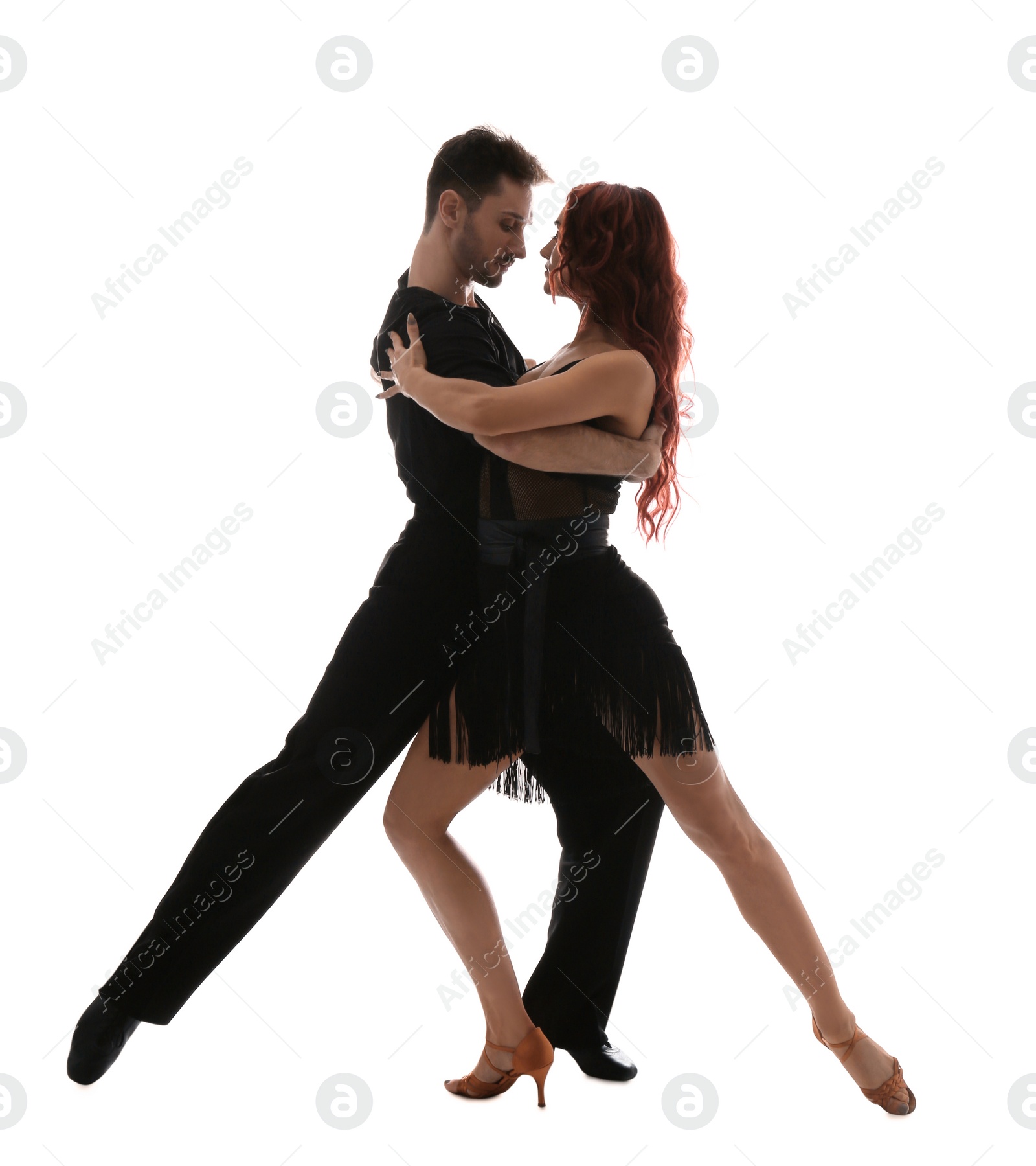 Photo of Passionate young couple dancing on white background