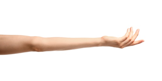 Photo of Young woman holding hand on white background, closeup