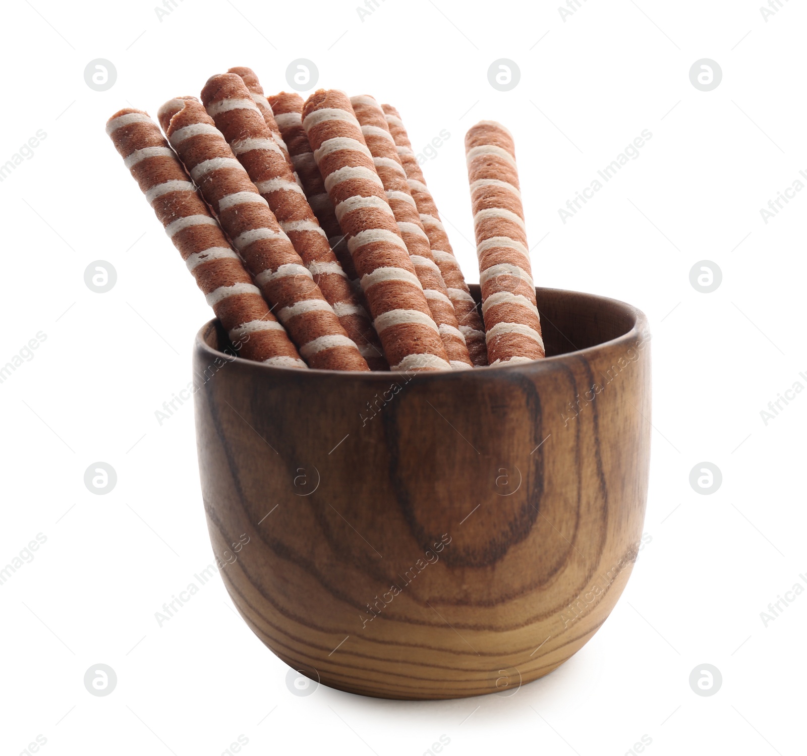 Photo of Bowl with tasty wafer roll sticks on white background. Crispy food