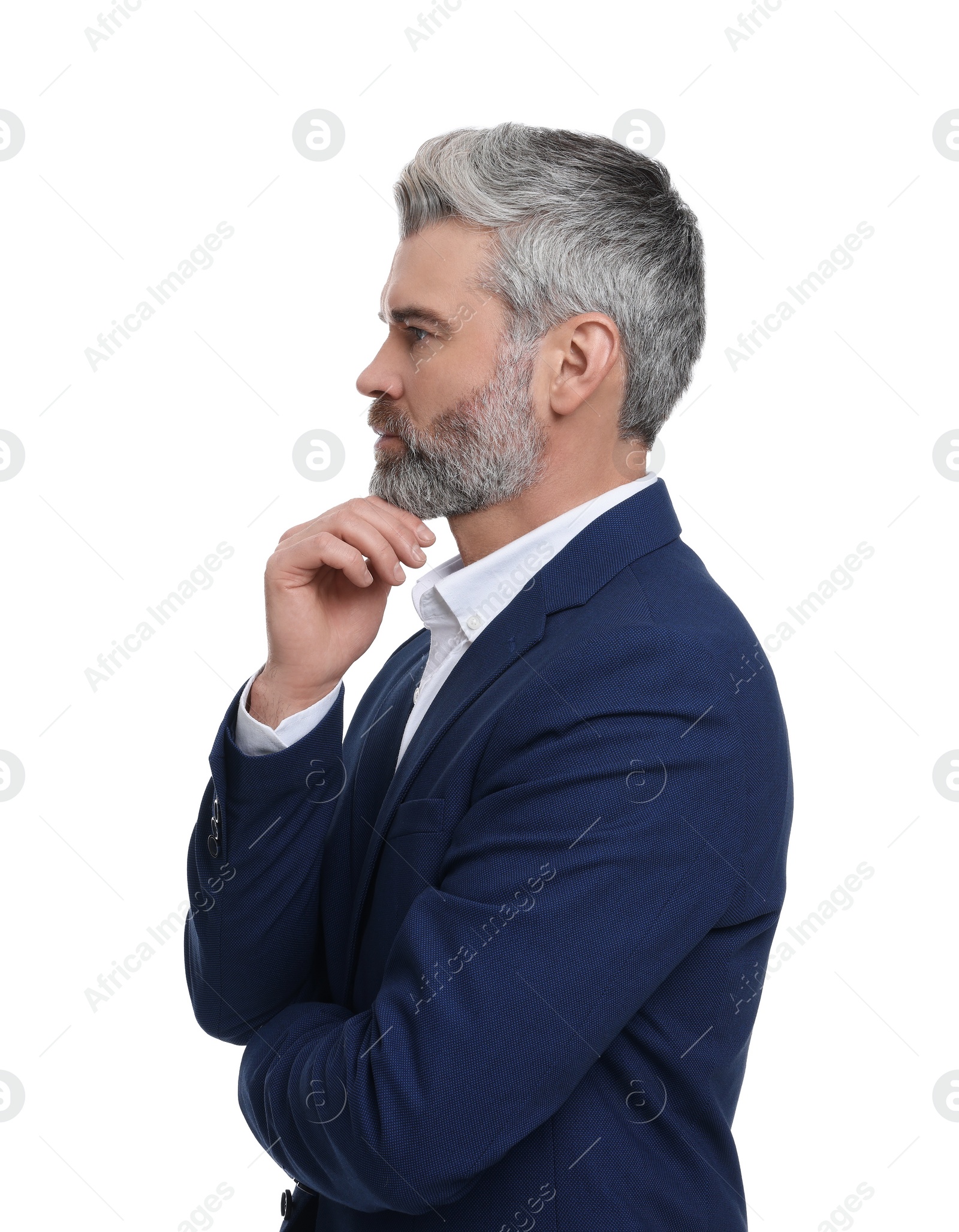 Photo of Mature businessman in stylish clothes posing on white background