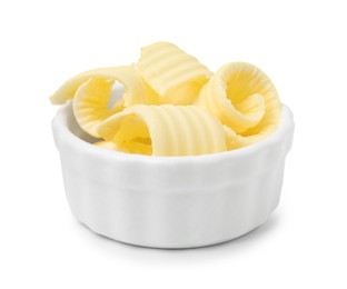 Tasty butter curls in bowl isolated on white