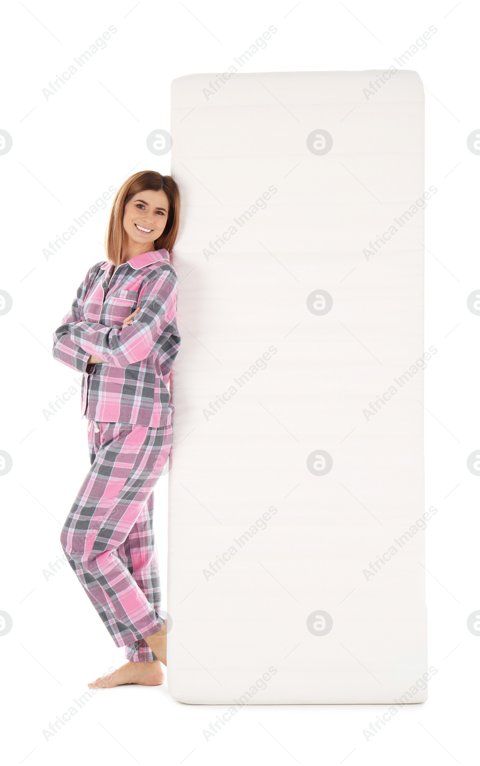 Photo of Woman with comfortable mattress isolated on white