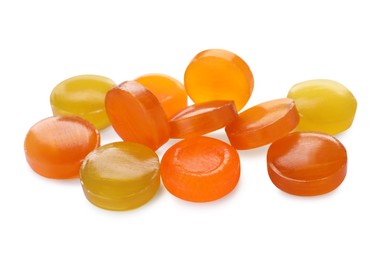 Many different color cough drops on white background