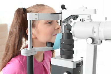 Little girl visiting ophthalmologist in clinic