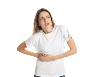 Young woman suffering from liver pain on white background