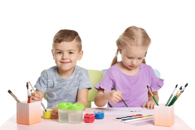 Photo of Cute children painting picture at table on white background