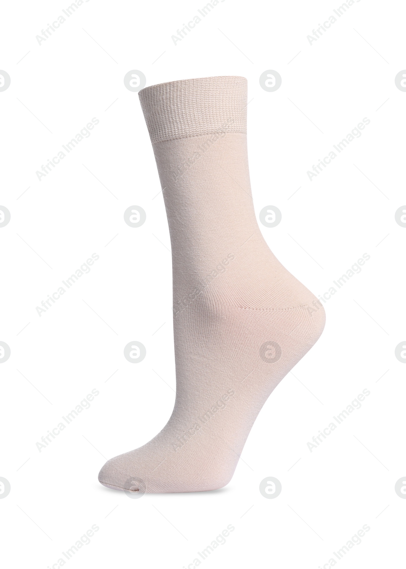 Photo of Beige sock isolated on white. Footwear accessory