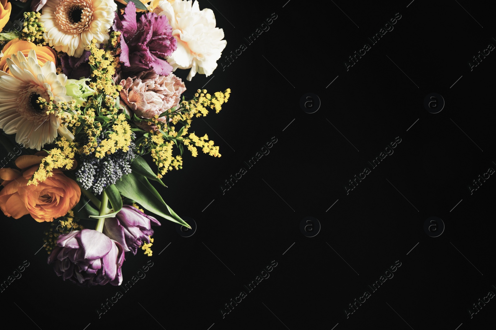 Photo of Beautiful bouquet of different flowers on black background, space for text. Floral card design with dark vintage effect