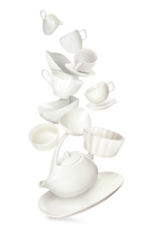Set of clean tableware in flight on white background