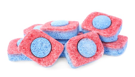 Photo of Pile of dishwasher detergent tablets on white background