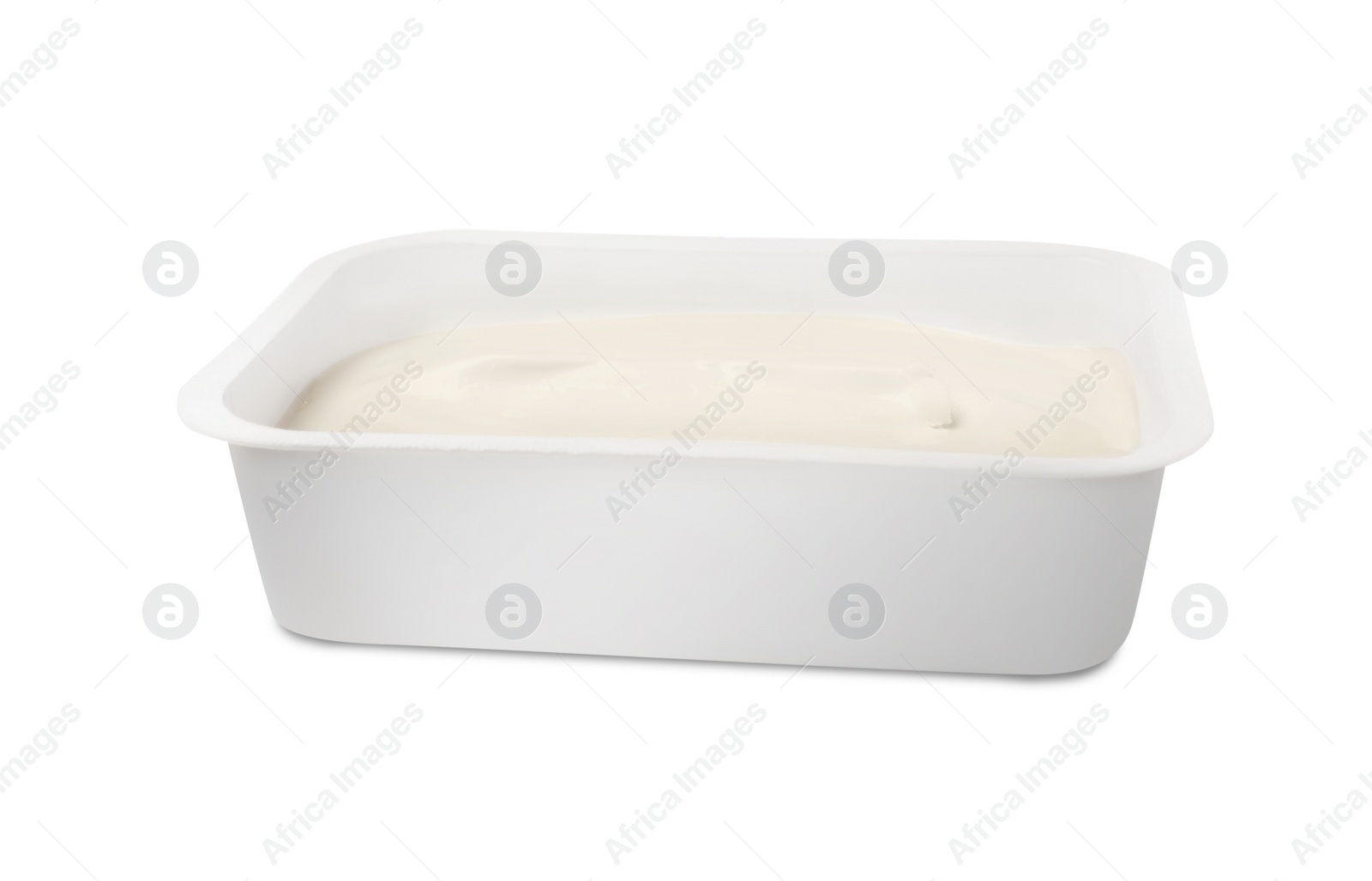 Photo of Plastic container of tasty cream cheese isolated on white