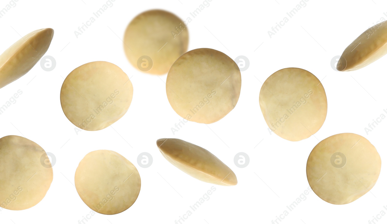 Image of Many lentils falling on white background, banner design. Vegan diet 