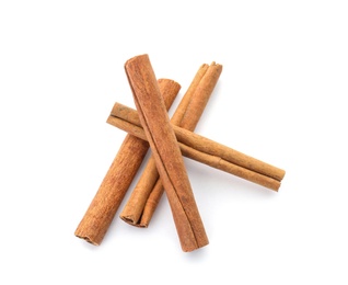 Aromatic cinnamon sticks on white background