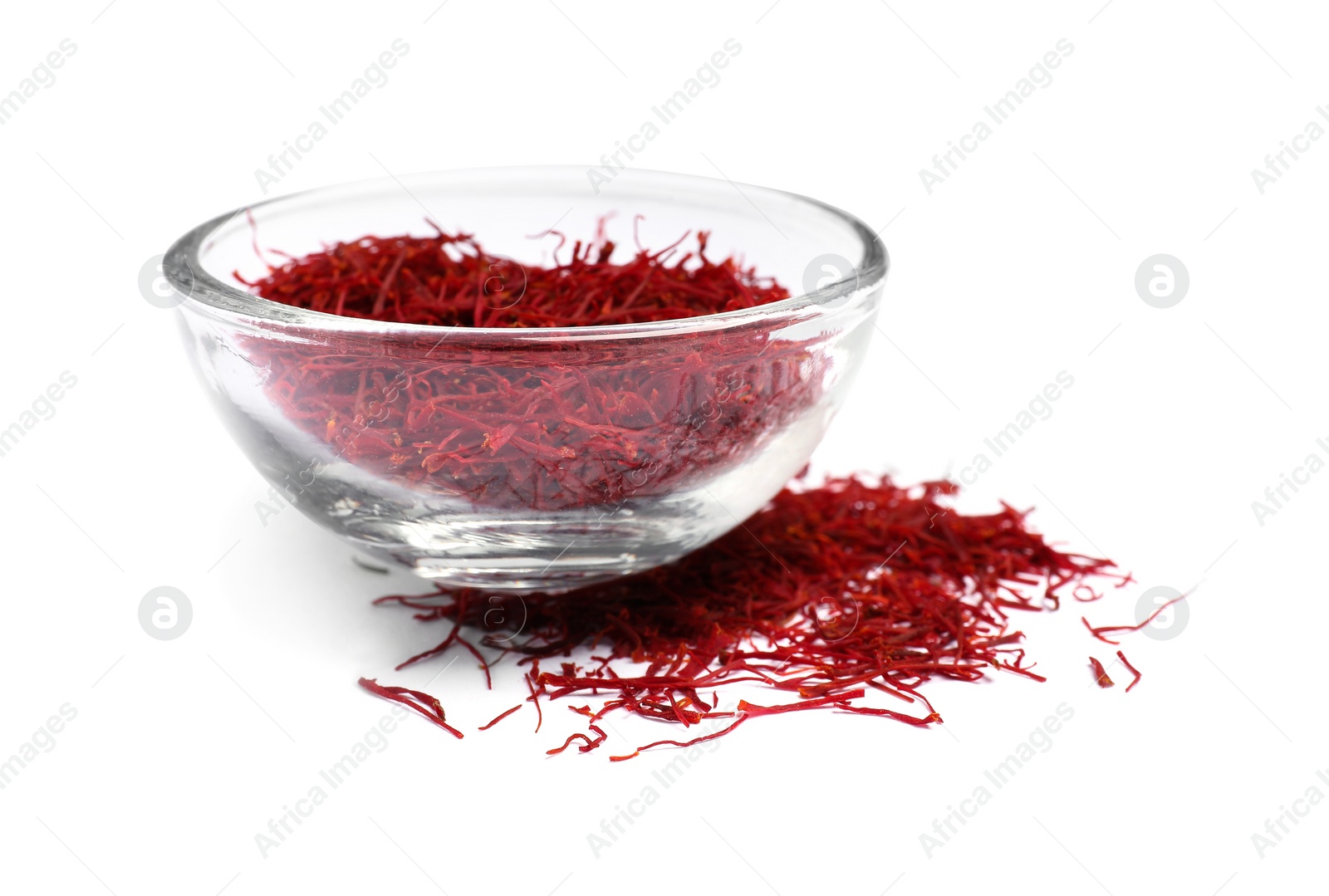 Photo of Aromatic saffron and bowl isolated on white