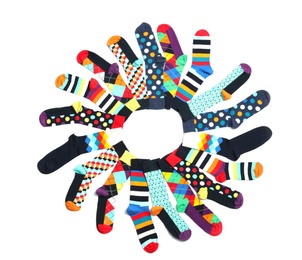 Flat lay composition with different colorful socks on white background