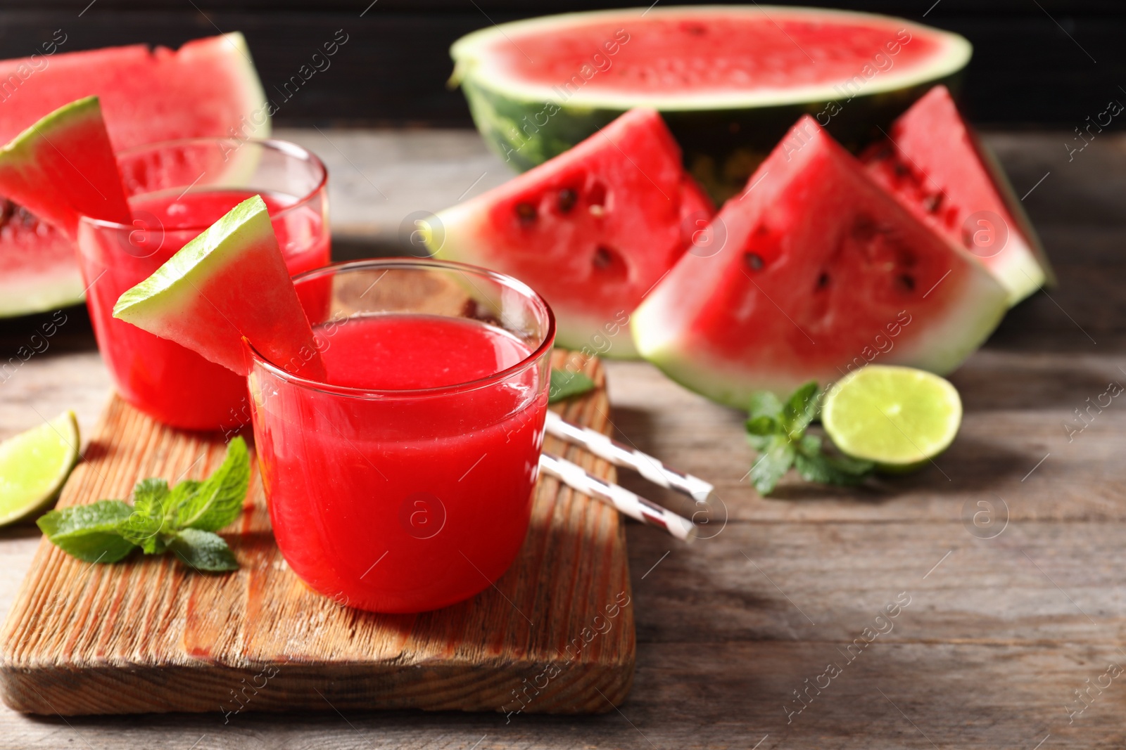 Photo of Summer watermelon drink in glasses served on table