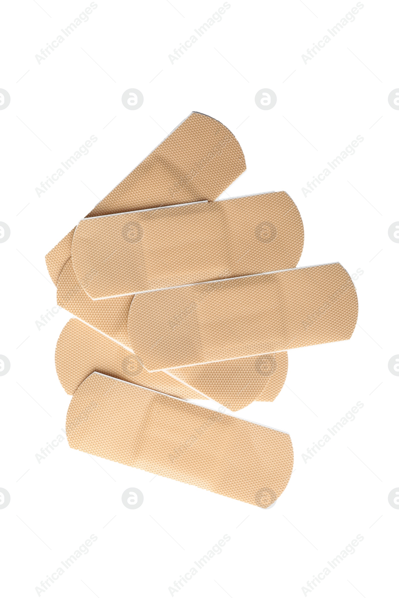 Medical sticking plasters isolated on white. First aid item Photo of Medical sticking plasters isolated on white. First aid item