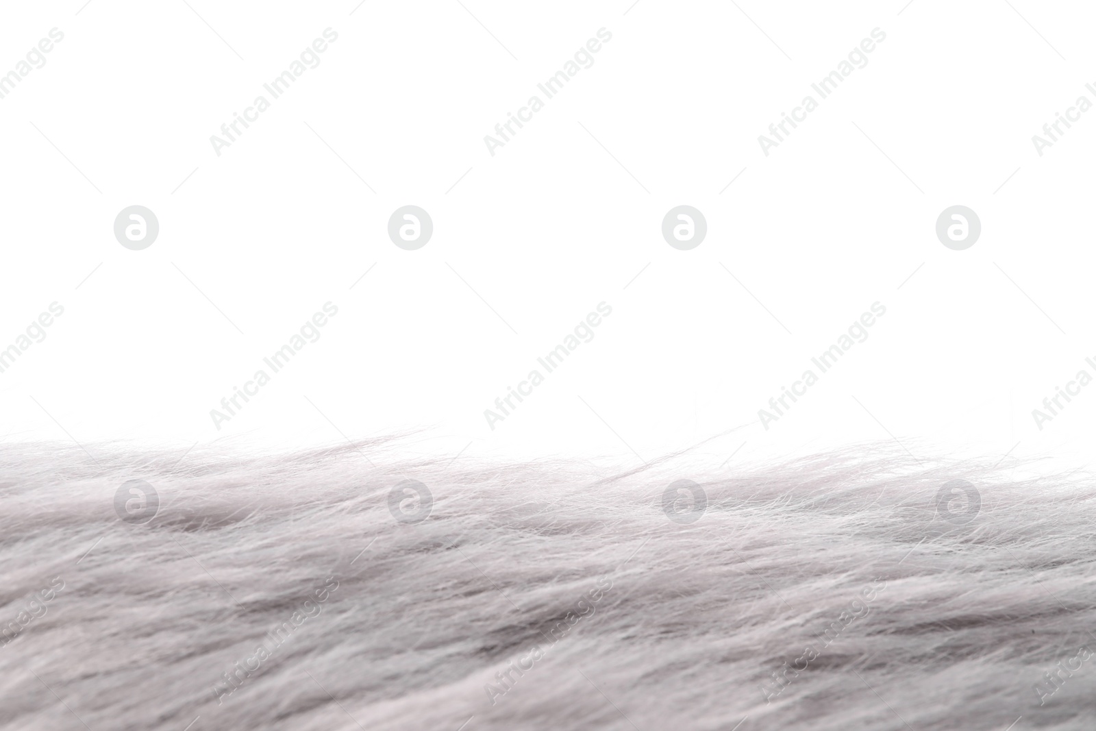 Photo of Soft grey faux fur isolated on white