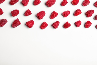 Photo of Composition with delicious ripe raspberries on white background, top view