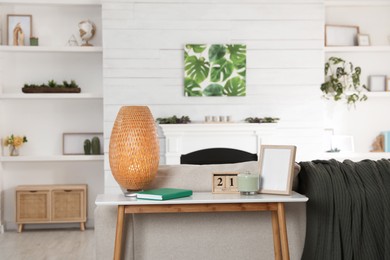 Photo of Living room interior with console table and stylish decor