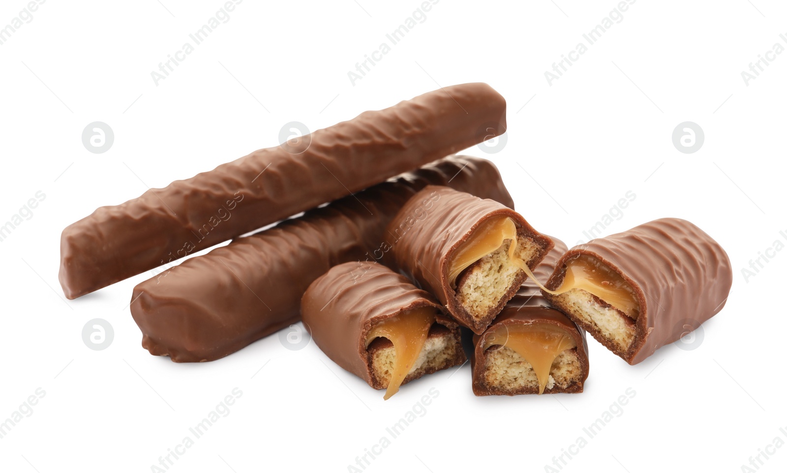 Photo of Sweet tasty chocolate bars with caramel on white background