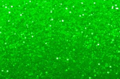 Image of St. Patrick day. Green glitter as background