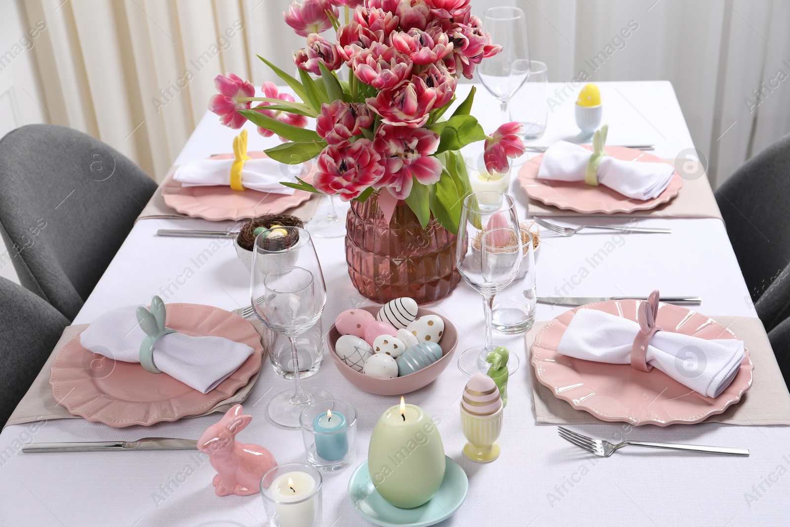 Photo of Festive table setting with beautiful flowers. Easter celebration