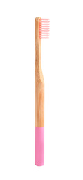 Bamboo toothbrush with pink bristle isolated on white