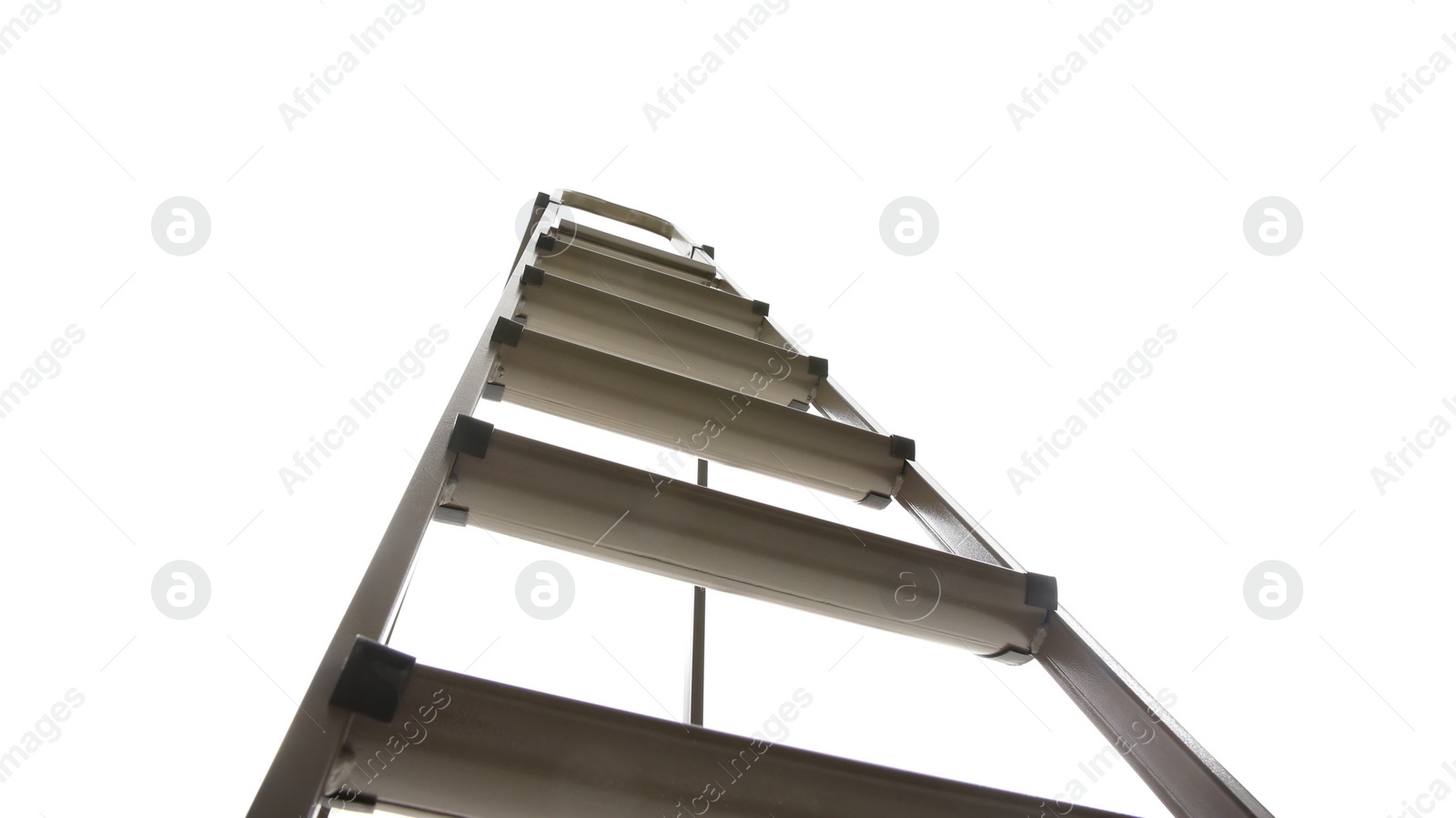 Photo of Metal stepladder isolated on white, low angle view