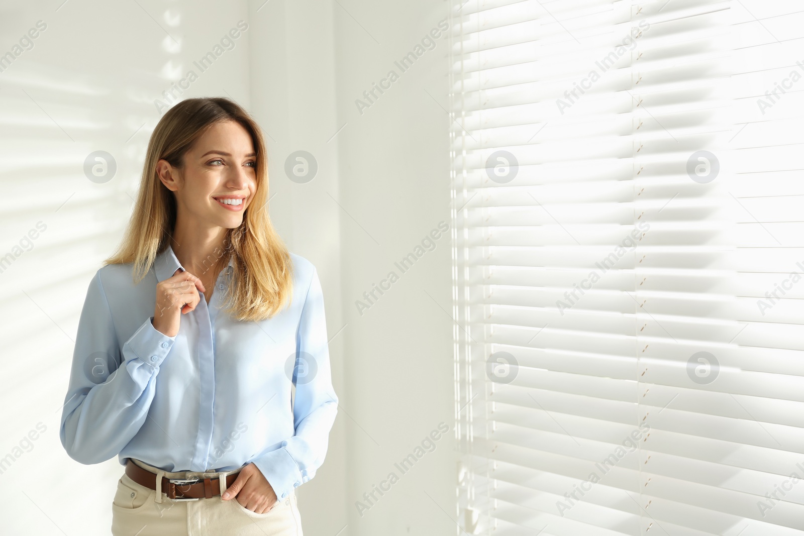 Photo of Portrait of beautiful young businesswoman in office