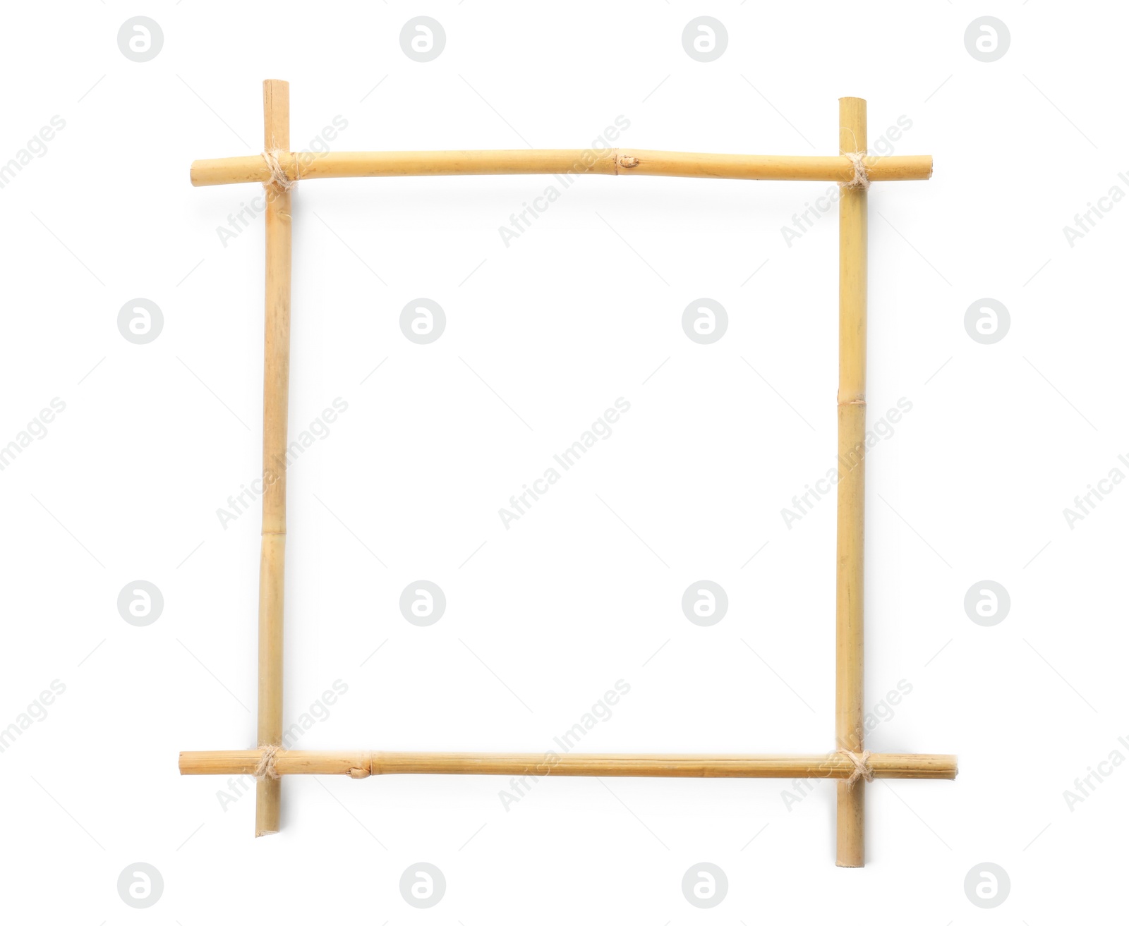 Photo of Frame made of dry bamboo sticks on white background. Space for design