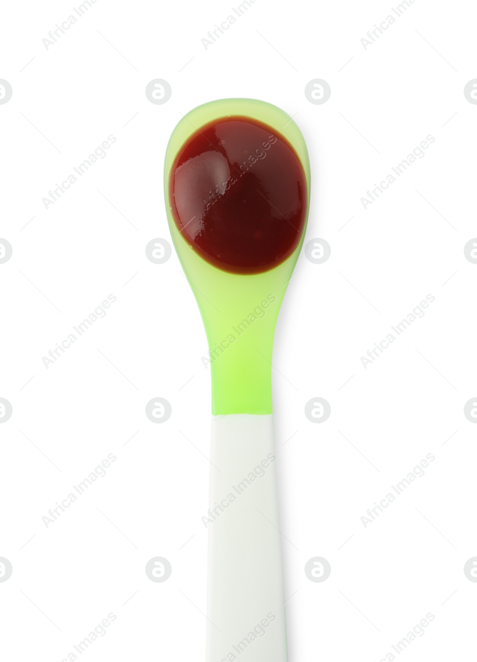 Photo of Healthy baby food in spoon isolated on white, top view