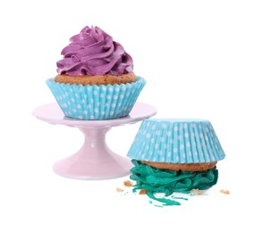 Photo of Smashed and good cupcakes on white background. Troubles happen